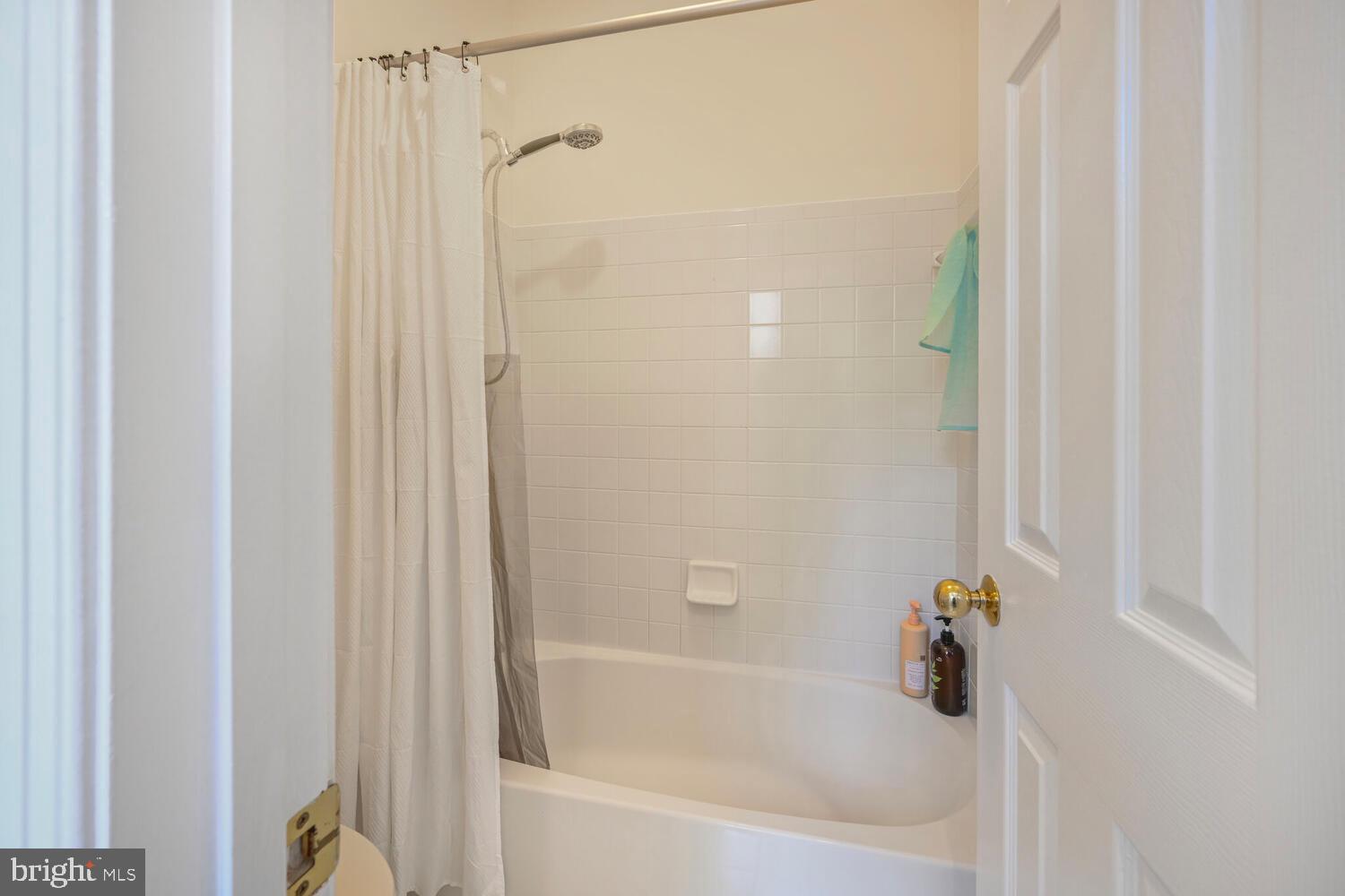 7401 Honesty Way Bethesda, MD 20817 - Photo 36 of 54 a bathroom with a bathtub