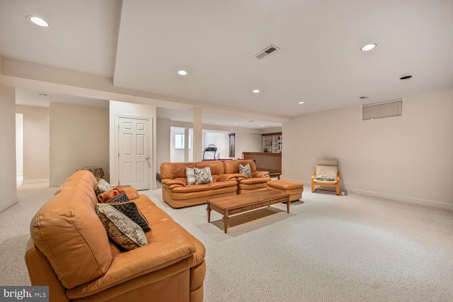 7401 Honesty Way Bethesda, MD 20817 - Photo 40 of 54 a living room with furniture and a couch