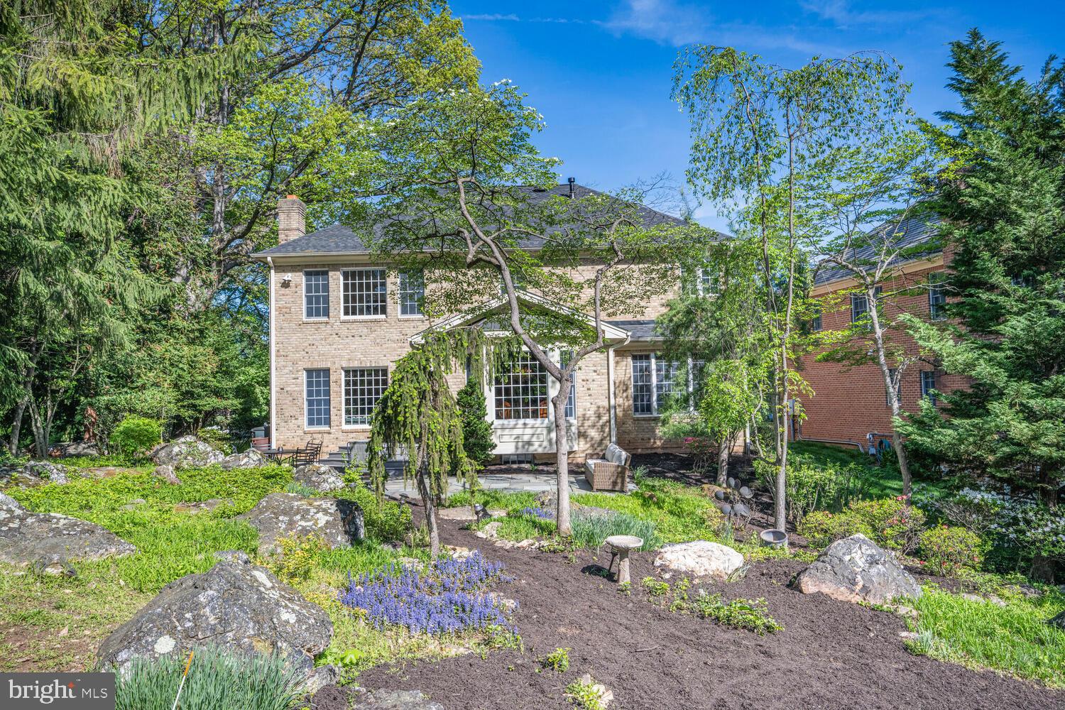 7401 Honesty Way Bethesda, MD 20817 - Photo 49 of 54 a view of a chairs in a backyard