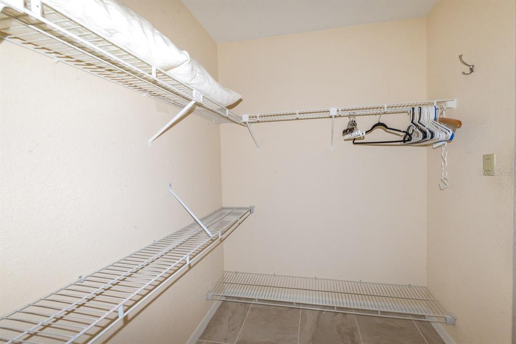 335 Coldeway Drive, Unit F21 Punta Gorda, FL 33950 - Photo 31 of 45 a view of a room with racks on the wall