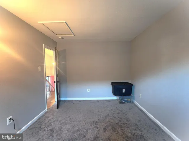 a view of a room and window