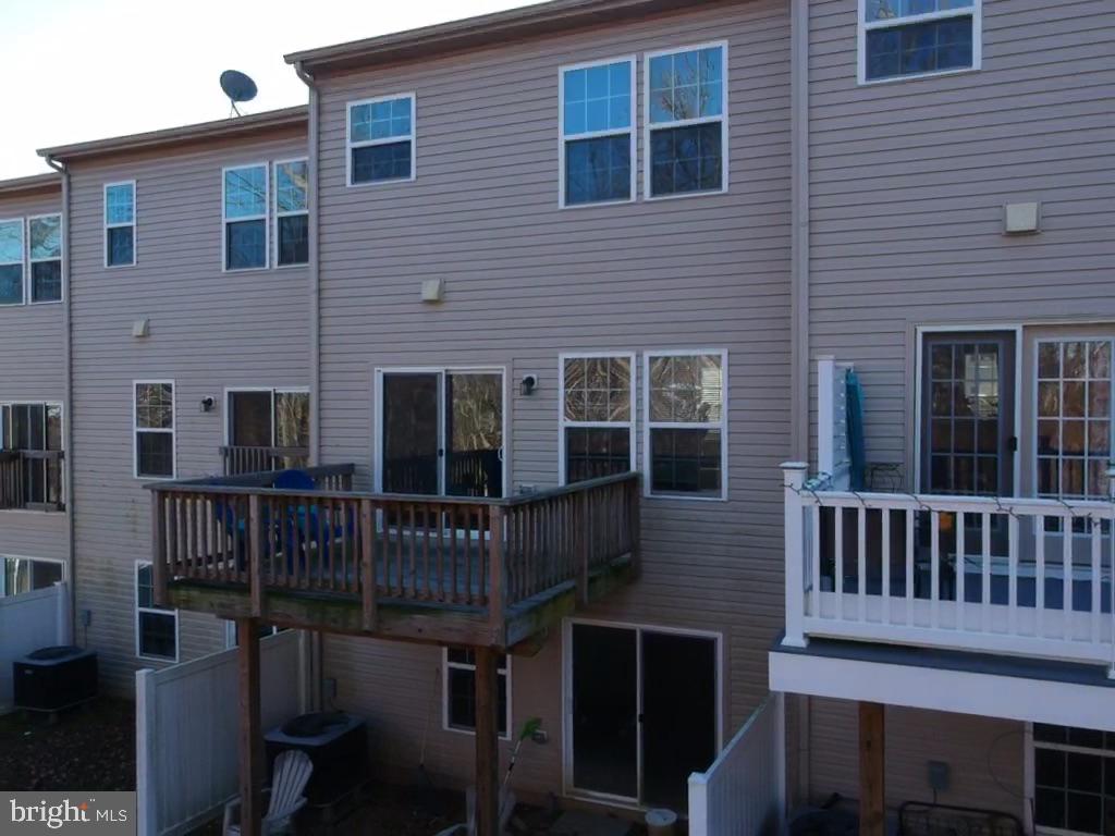 139 Gauley Riv Path Falling Waters, WV 25419 - Photo 3 of 43 View of the rear with the deck