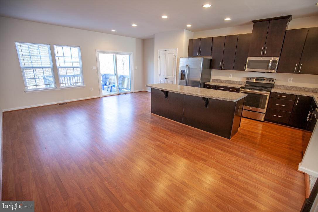 139 Gauley Riv Path Falling Waters, WV 25419 - Photo 5 of 43 Kitchen / Dining Area