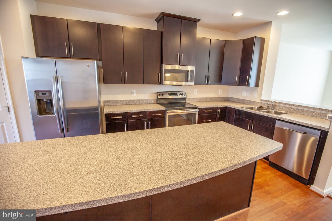 139 Gauley Riv Path Falling Waters, WV 25419 - Photo 7 of 43 Kitchen with Island