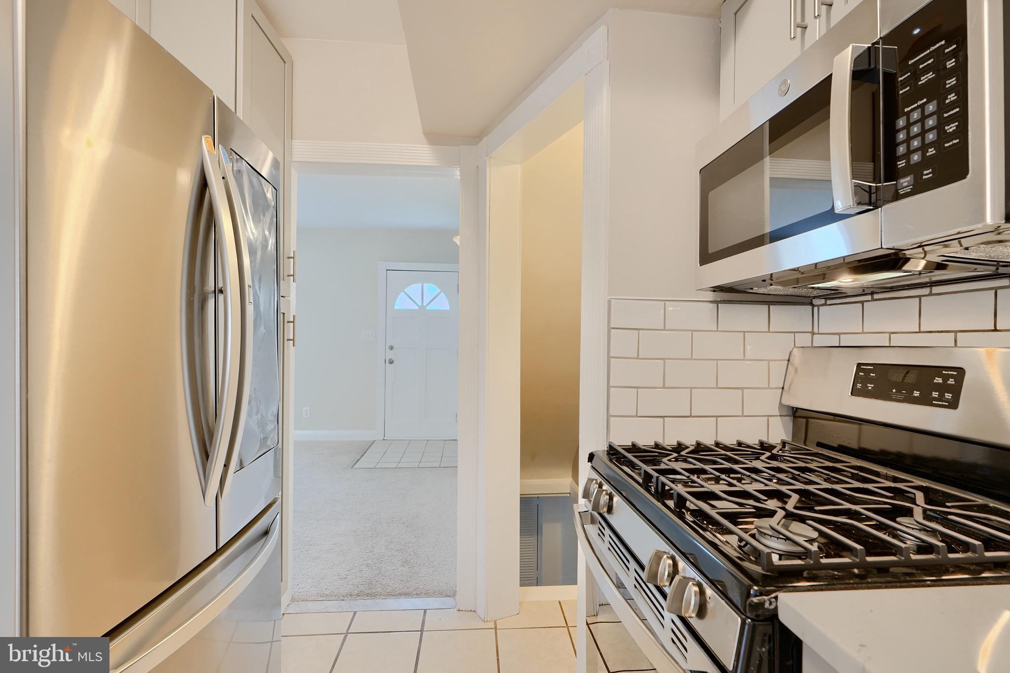 14 Briarwood Road Baltimore, MD 21228 - Photo 10 of 30 Stainless appliances, quartz counters
