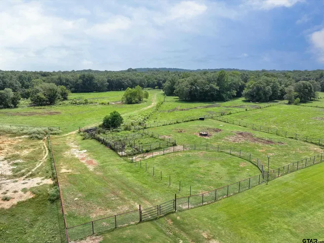 a view of swimming pool with a table and chairs