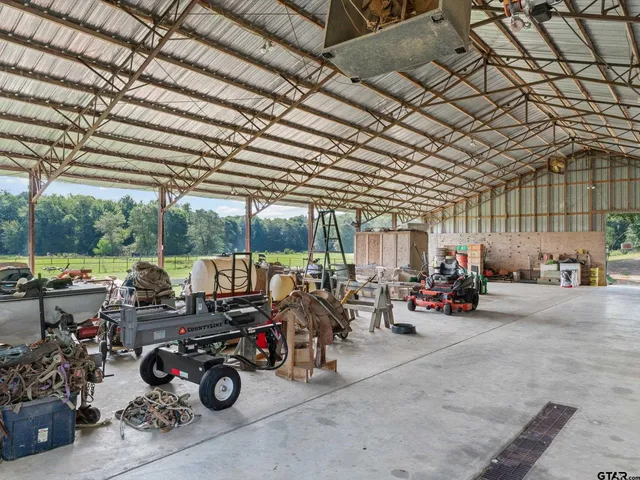 an outdoor space with furniture and a fireplace