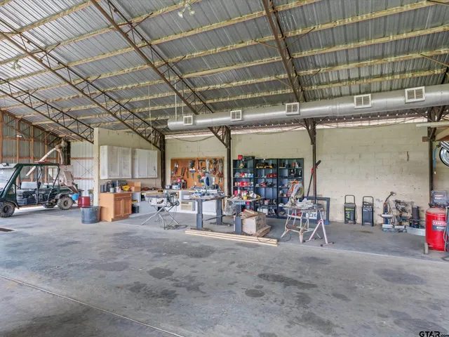 a view of a lake with a yard