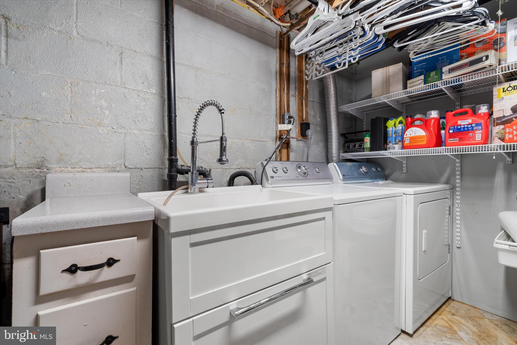 8304 Harland Drive Springfield, VA 22152 - Photo 33 of 39 a bathroom with a sink and a mirror