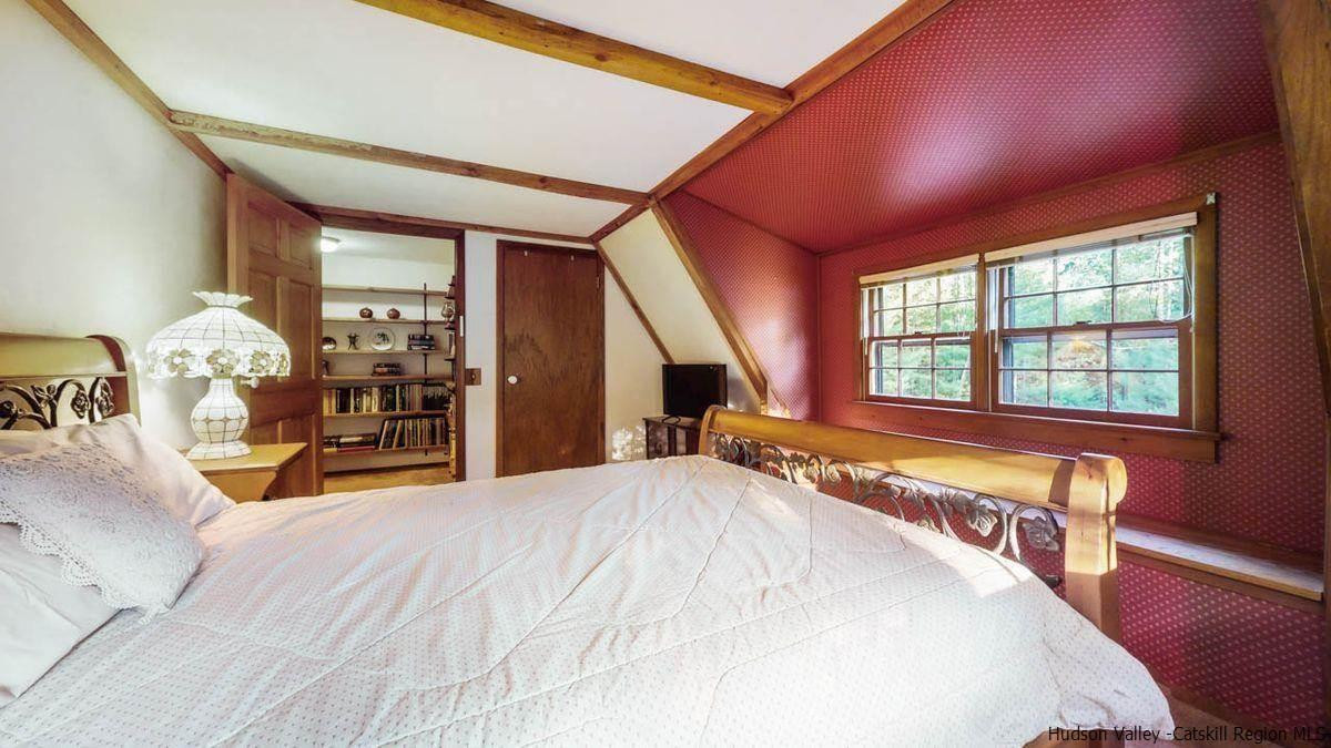 296 Bush Road Stone Ridge, NY 12484 - Photo 20 of 27 a view of a livingroom with furniture and staircase