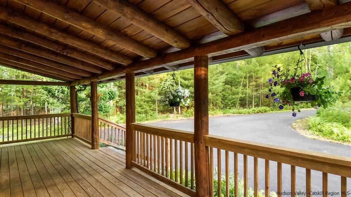 296 Bush Road Stone Ridge, NY 12484 - Photo 24 of 27 a view of porch with wooden floor