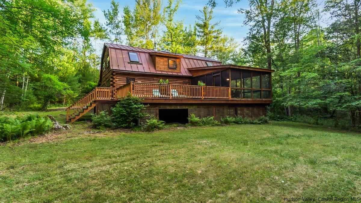 296 Bush Road Stone Ridge, NY 12484 - Photo 5 of 27 a view of a house with a backyard
