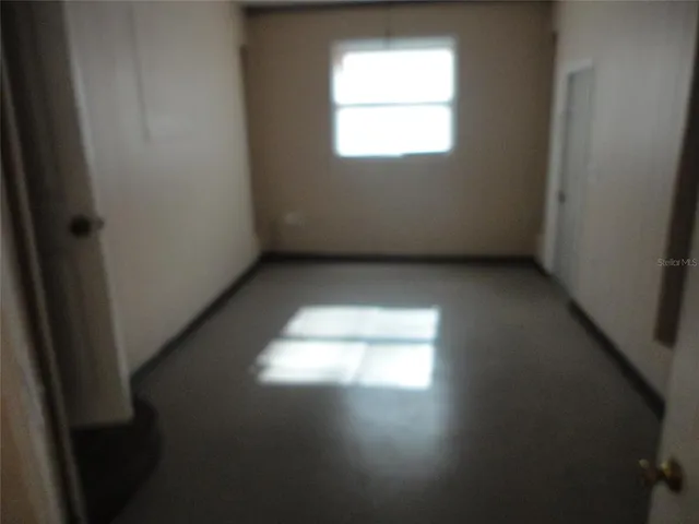 a view of empty room with window