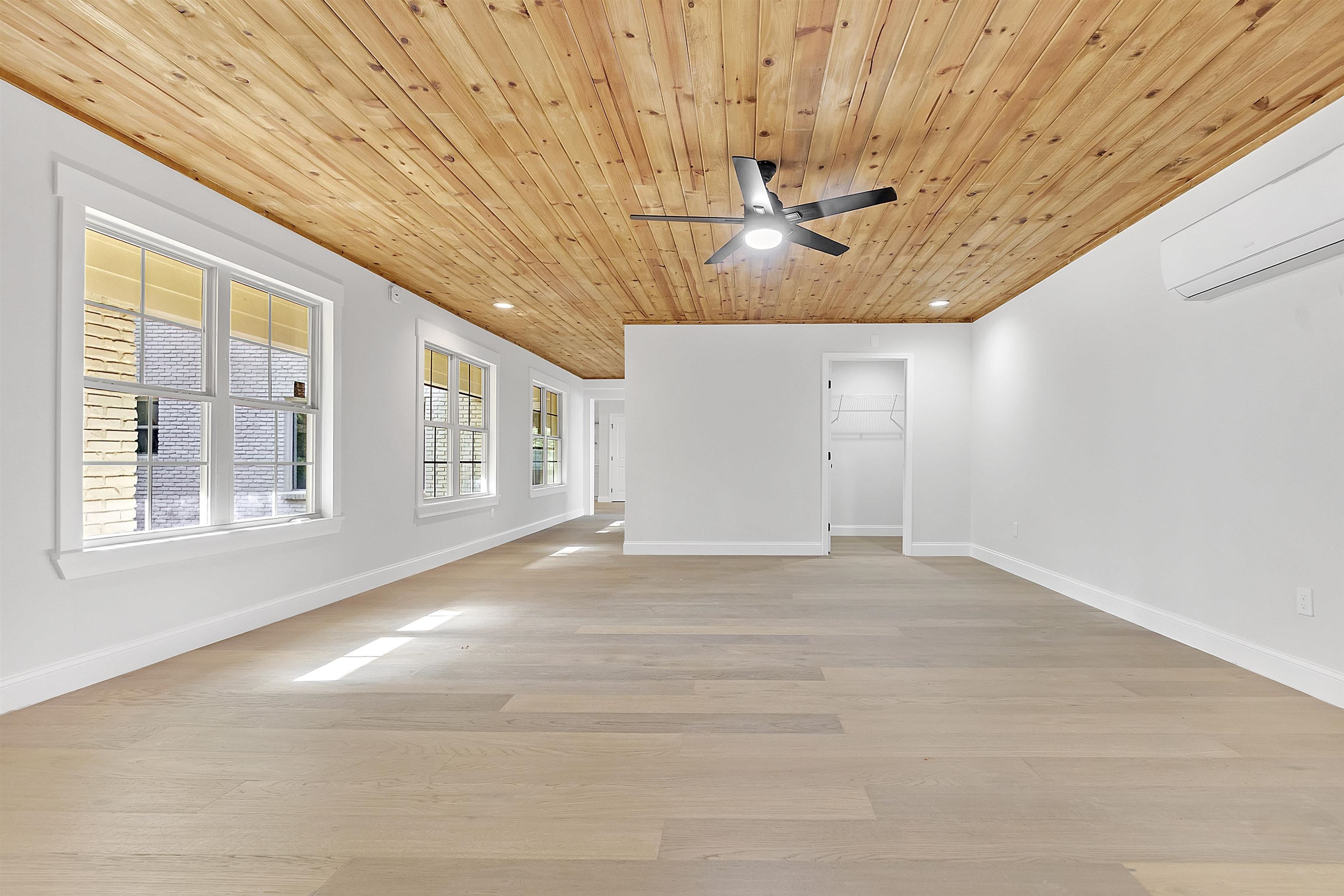 5385 Walnut Grove Road Memphis, TN 38120 - Photo 18 of 39 a view of an empty room with a window