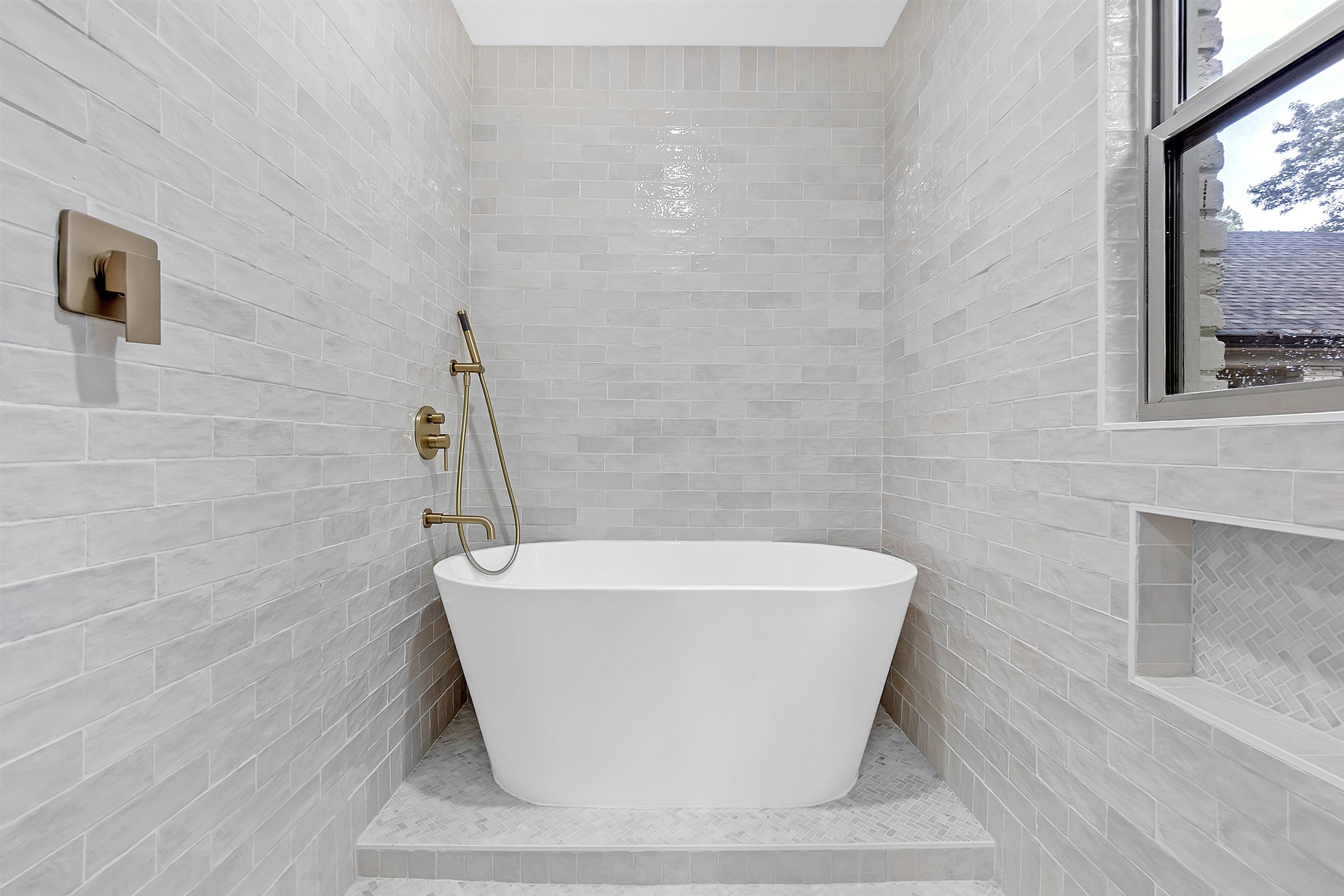 5385 Walnut Grove Road Memphis, TN 38120 - Photo 24 of 39 a white tub sitting next to a white wall