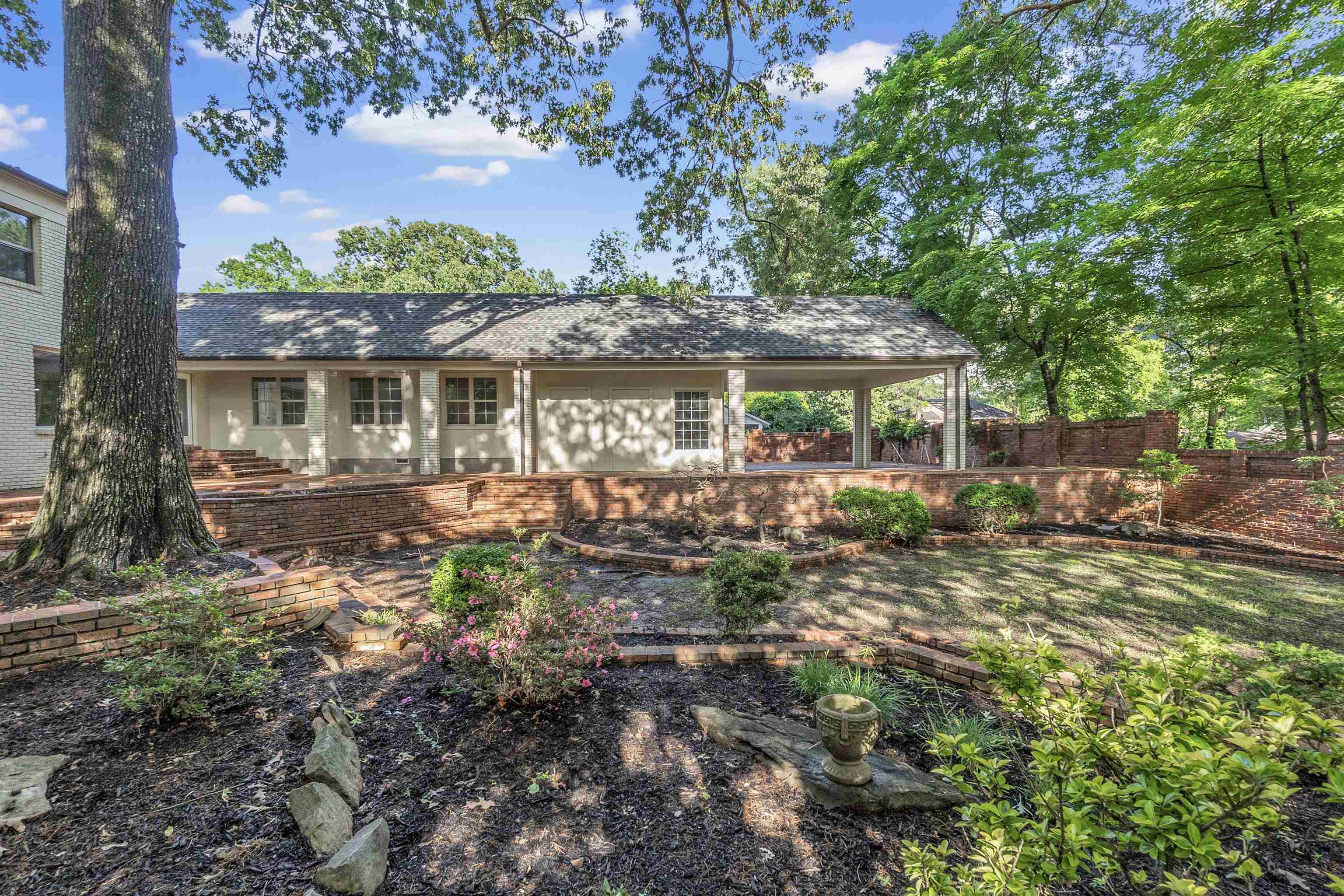 5385 Walnut Grove Road Memphis, TN 38120 - Photo 37 of 39 a view of a house with a yard balcony and sitting area