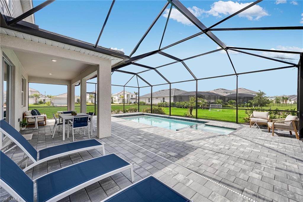 2318 Avocado Lane Naples, FL 34120 - Photo 15 of 47 a view of outdoor space with seating