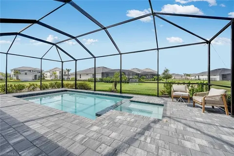 a view of a swimming pool with a porch