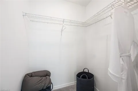 a small space with a shower and a window