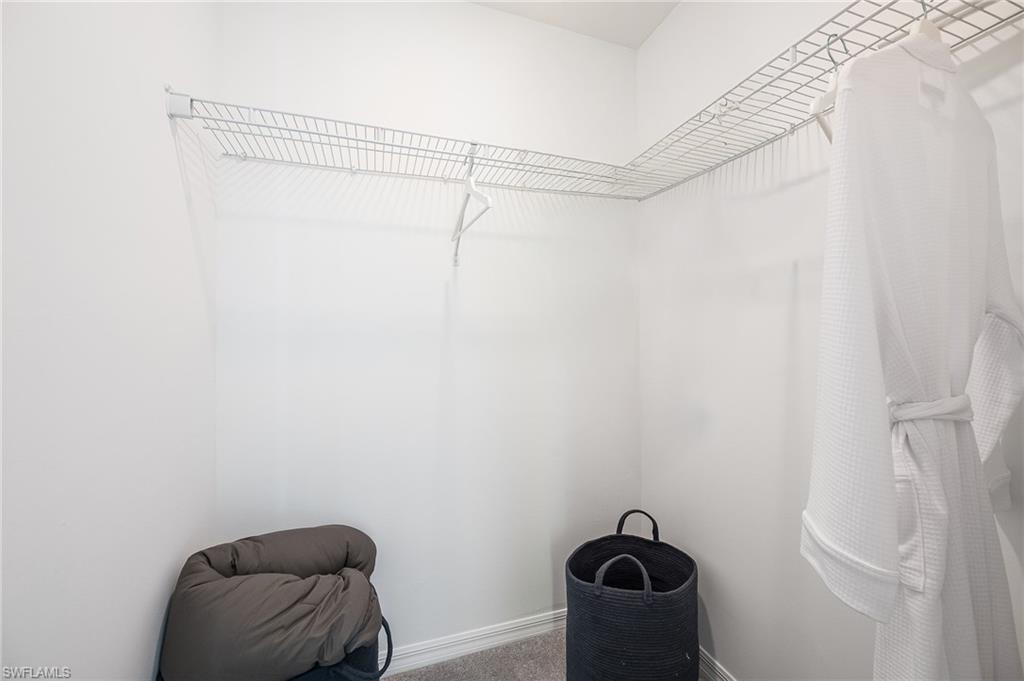 2318 Avocado Lane Naples, FL 34120 - Photo 36 of 47 a small space with a shower and a window