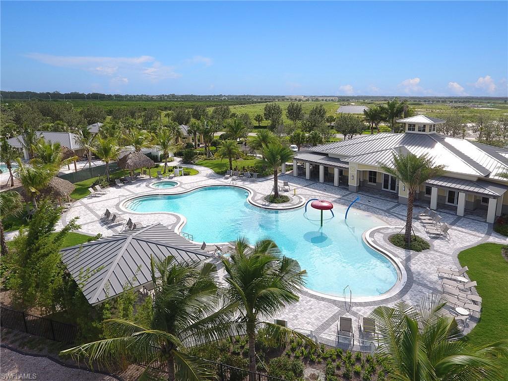 2318 Avocado Lane Naples, FL 34120 - Photo 41 of 47 an aerial view of residential houses with outdoor space and swimming pool
