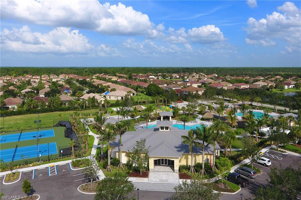 2318 Avocado Lane Naples, FL 34120 - Photo 43 of 47 an aerial view of residential houses with outdoor space and street view