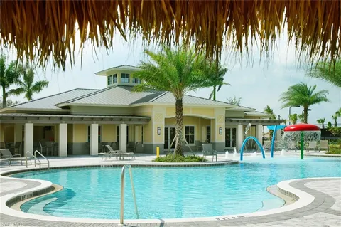 a view of a swimming pool with a patio