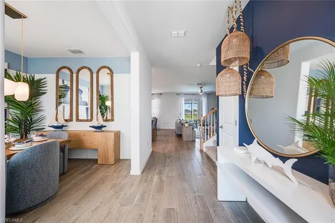 a view of living room and dining room