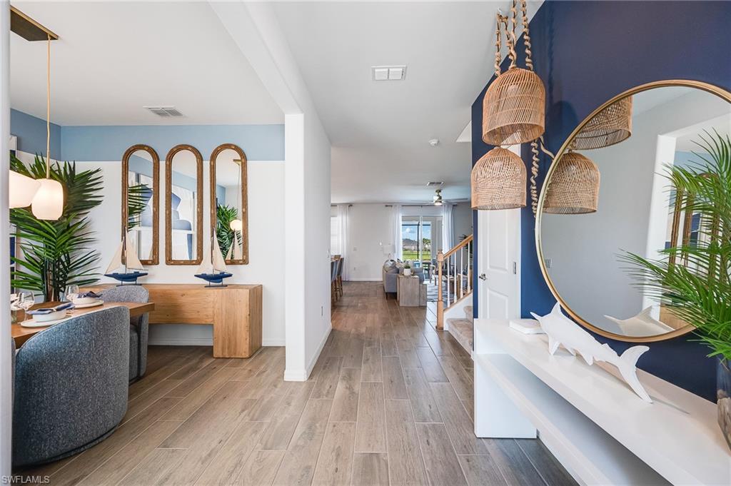 2318 Avocado Lane Naples, FL 34120 - Photo 8 of 47 a view of living room and dining room