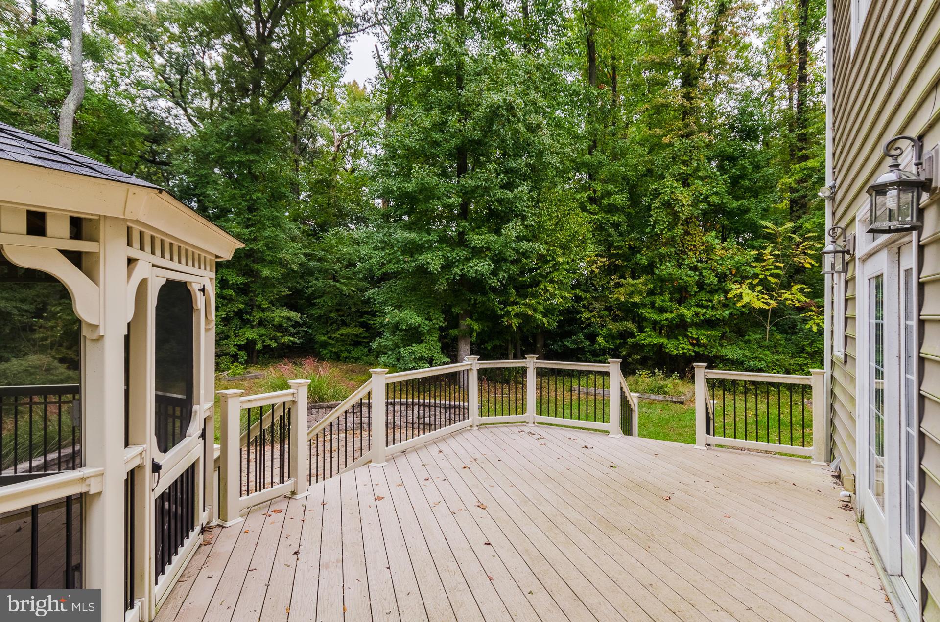 3902 Goose Harbor Road Middle River, MD 21220 - Photo 26 of 30 a view of a house with a deck