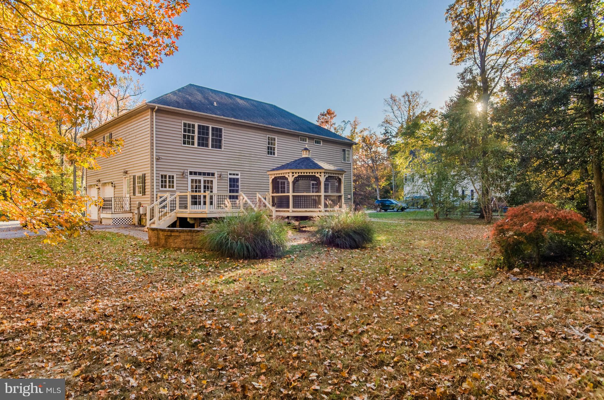 3902 Goose Harbor Road Middle River, MD 21220 - Photo 28 of 30 a view of a house with backyard and sitting area