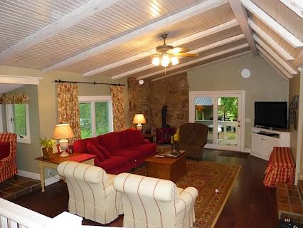 6821 Burkitt Road Antioch, TN 37013 - Photo 3 of 20 SPACIOUS DEN OPEN TO KITCHEN AND DINING WITH HARDWOOD FLOORS AND WOODSTOVE