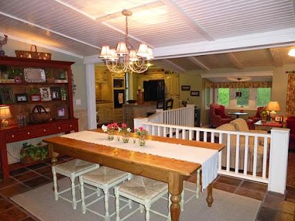 6821 Burkitt Road Antioch, TN 37013 - Photo 4 of 20 DINING ROOM WITH TILE FLOORS, WOOD CEILING OVERLOOKING KITCHEN AND DEN