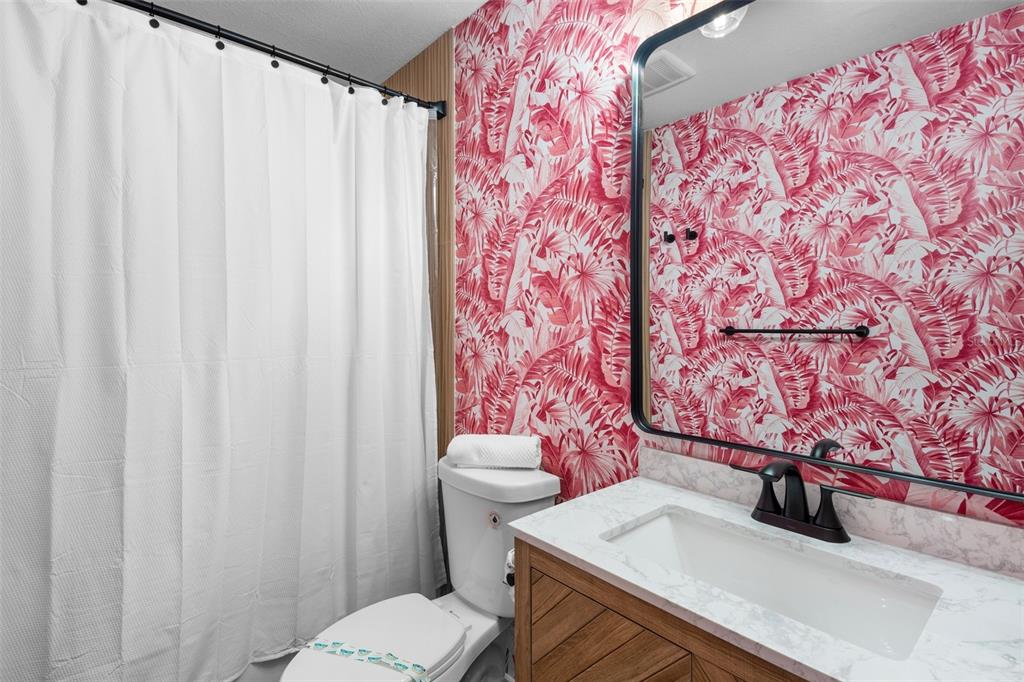 442 62nd Street Holmes Beach, FL 34217 - Photo 16 of 29 a bathroom with a sink and toilet