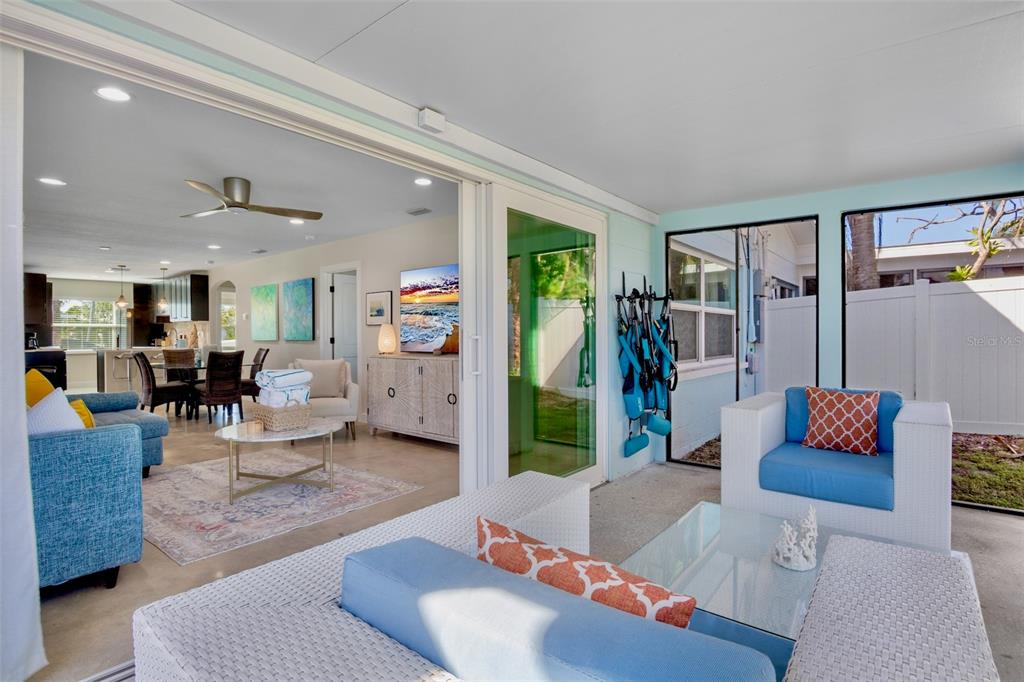 442 62nd Street Holmes Beach, FL 34217 - Photo 17 of 29 a living room with furniture and a rug