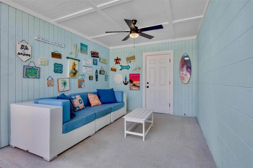 442 62nd Street Holmes Beach, FL 34217 - Photo 19 of 29 a living room with furniture and a window