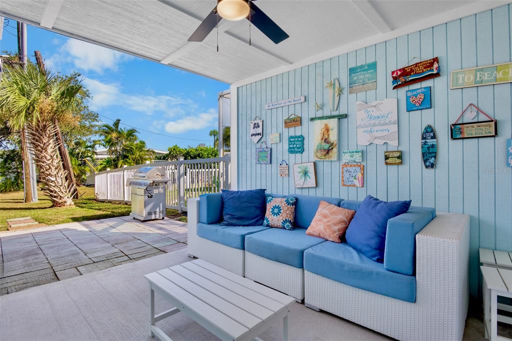 442 62nd Street Holmes Beach, FL 34217 - Photo 21 of 29 a living room with furniture and a large window