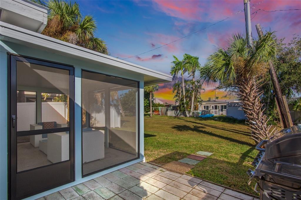 442 62nd Street Holmes Beach, FL 34217 - Photo 24 of 29 a couple of potted plants in front of building
