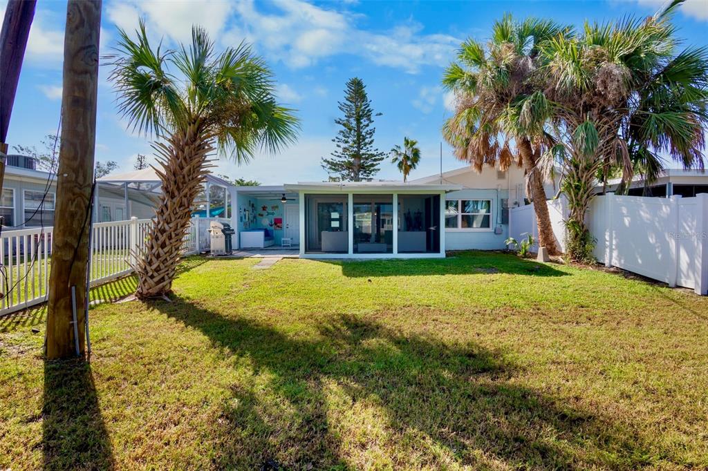 442 62nd Street Holmes Beach, FL 34217 - Photo 27 of 29 a view of house with a swimming pool