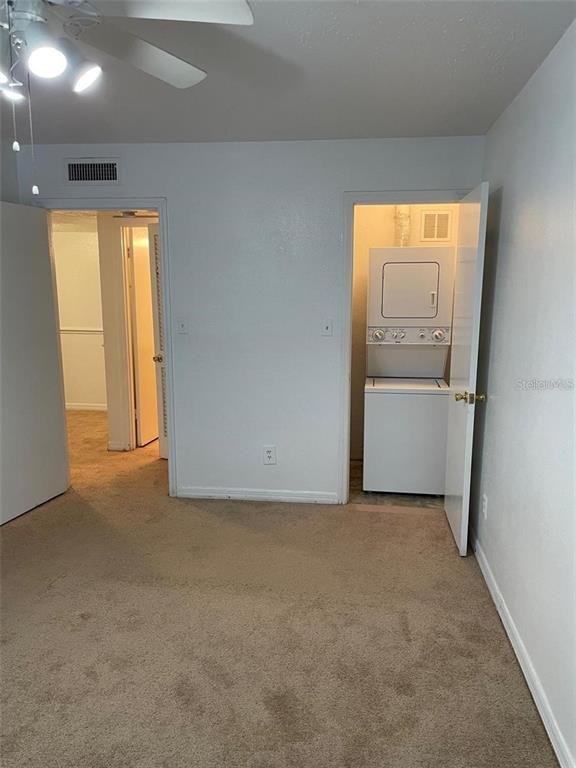 315 Wymore Road, Unit 104 Altamonte Springs, FL 32714 - Photo 8 of 10 a view of an empty room with a window