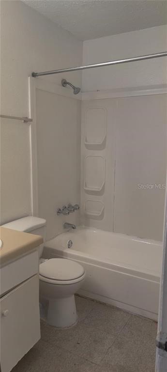 315 Wymore Road, Unit 104 Altamonte Springs, FL 32714 - Photo 9 of 10 a bathroom with a toilet and a shower