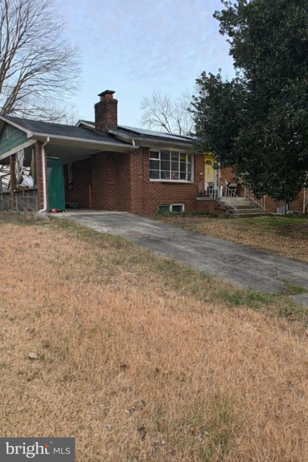 11502 Keystone Avenue Clinton, MD 20735 - Photo 1 of 1 a front view of a house with a garden