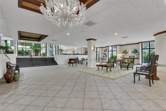 a outdoor space with lots of furniture and lots of potted plants