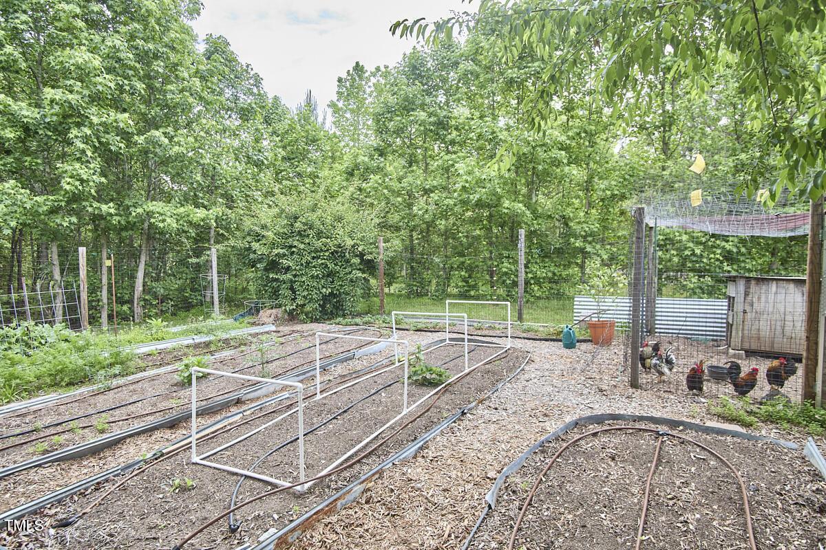 909 Goodwin Road Durham, NC 27712 - Photo 39 of 52 a view of a backyard with a patio