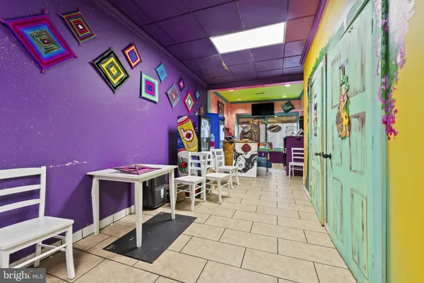 a view of an entryway with a rug