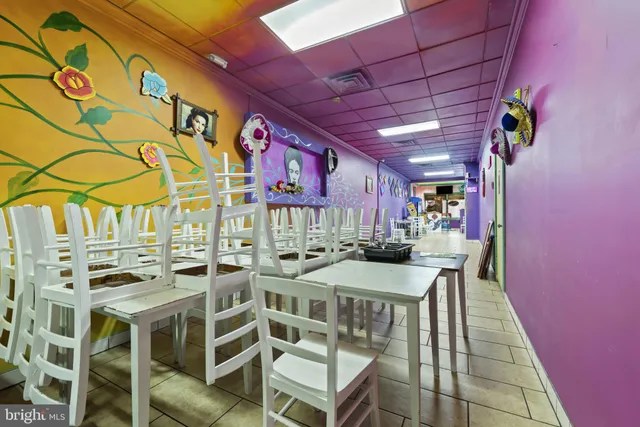 a room with a table and a chair