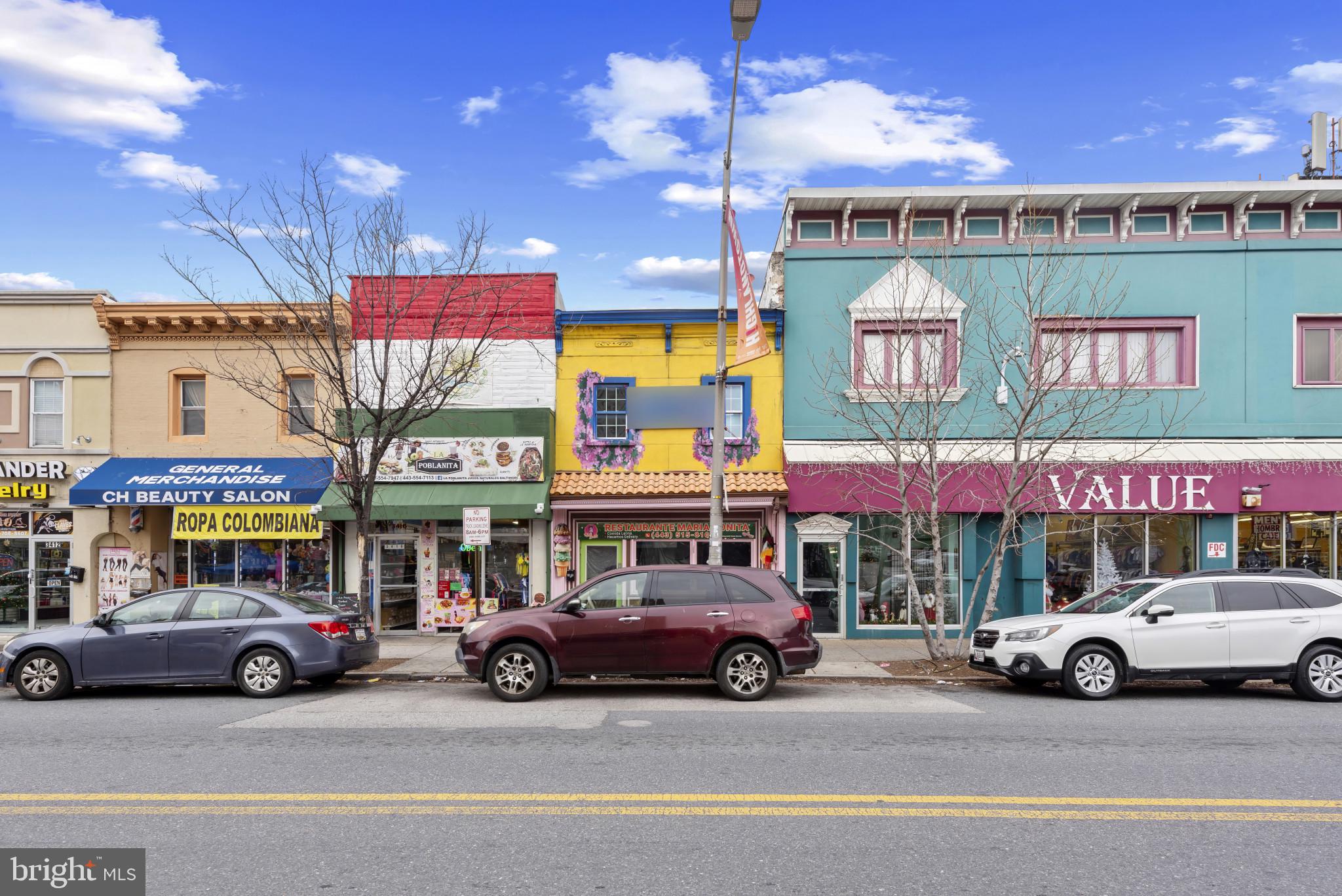 3418 Eastern Avenue Baltimore, MD 21224 - Photo 2 of 53 a view of a cars park in front of a store
