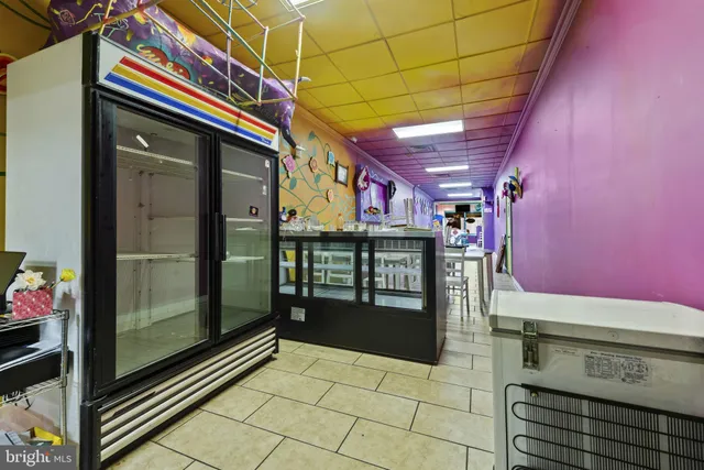 a kitchen with stainless steel appliances granite countertop a stove and cabinets