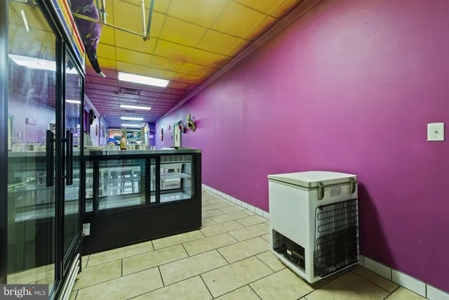 a kitchen with stainless steel appliances granite countertop a sink and a stove