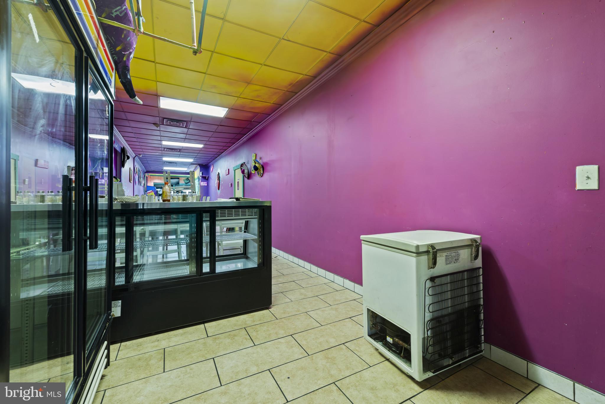 3418 Eastern Avenue Baltimore, MD 21224 - Photo 23 of 53 a room with a table and a chair